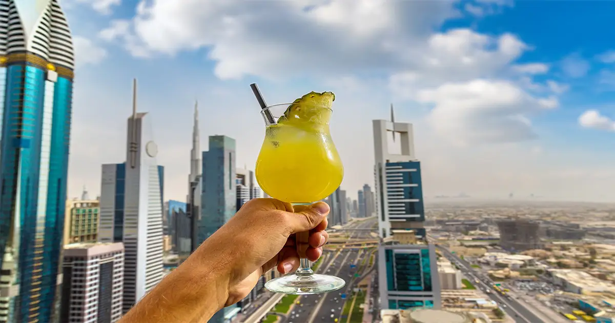 A man drinking juice in Japanese restaurants in Dubai